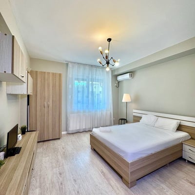 Location d’un appartement chaleureux d’une pièce avec balcon à Chiajna, près de Bucarest, Roumanie